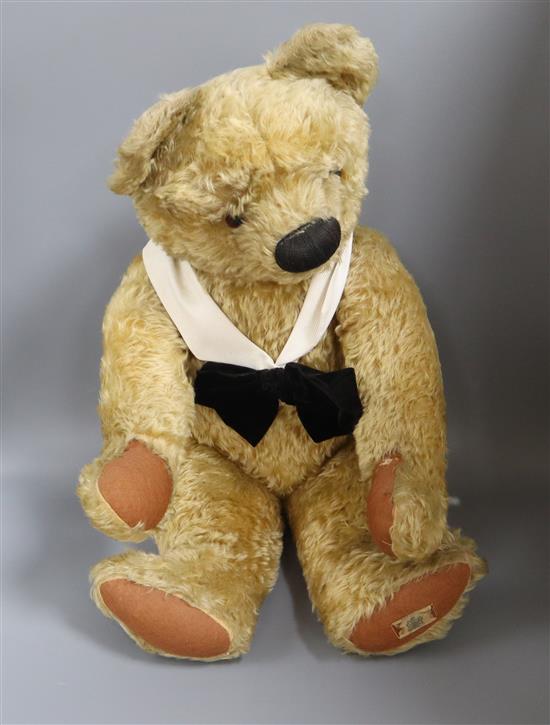 A large Chad Valley bear, foot label, very good condition, small tear to left paw pad, glass eyes, thick mohair